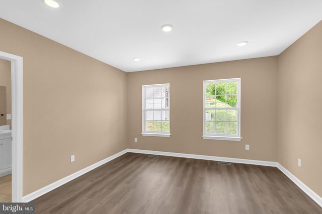 4820 Hayes St NE, Washington, DC 20019 - spare room featuring dark wood finished floors, baseboards, and recessed lighting