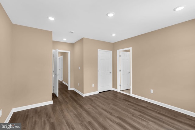 4820 Hayes St NE, Washington, DC 20019 - unfurnished bedroom with baseboards, dark wood finished floors, and recessed lighting
