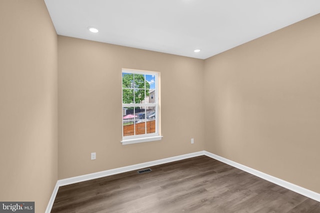 4820 Hayes St NE, Washington, DC 20019 - spare room featuring baseboards, dark wood-style flooring, and recessed lighting