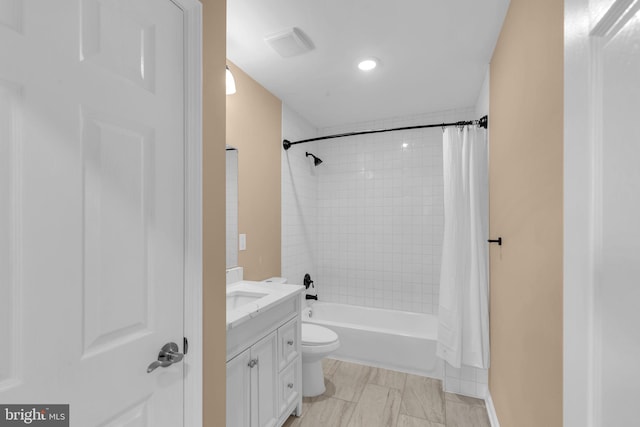 4820 Hayes St NE, Washington, DC 20019 - bathroom with vanity, shower / bath combo with shower curtain, toilet, and recessed lighting