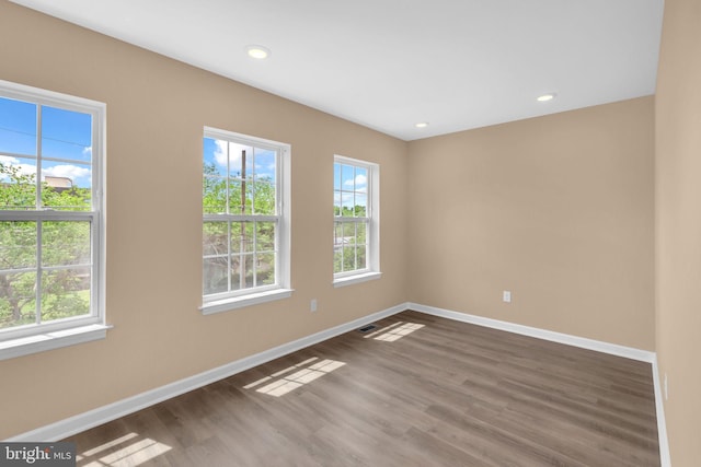 4820 Hayes St NE, Washington, DC 20019 - unfurnished room with baseboards, wood finished floors, and recessed lighting