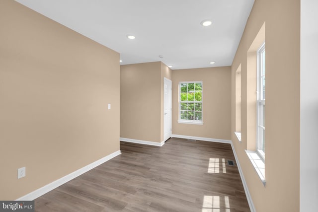 4820 Hayes St NE, Washington, DC 20019 - spare room featuring baseboards, recessed lighting, and wood finished floors