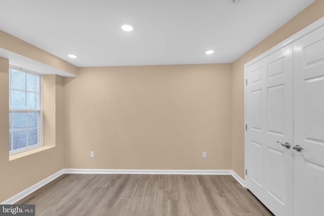 4820 Hayes St NE, Washington, DC 20019 - unfurnished bedroom featuring light wood finished floors, baseboards, a closet, and recessed lighting