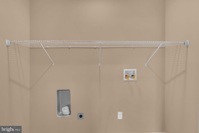 4820 Hayes St NE, Washington, DC 20019 - clothes washing area featuring hookup for an electric dryer and washer hookup