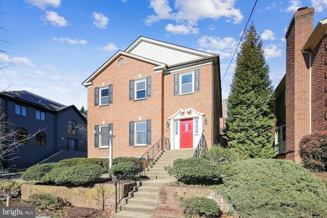 view of front of home with brick siding