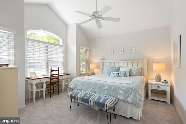 bedroom with carpet floors, high vaulted ceiling, baseboards, and a ceiling fan