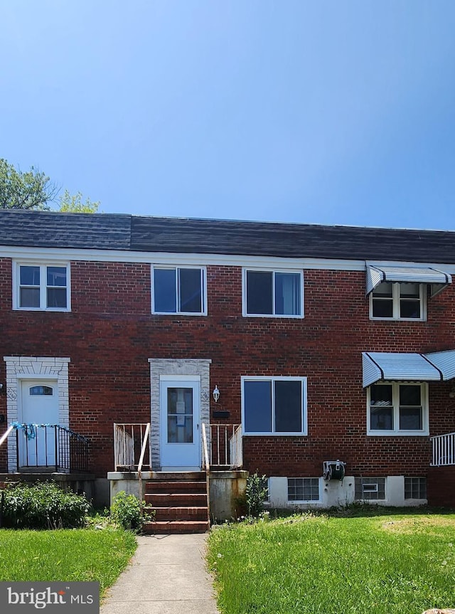 2247 Searles Rd, Baltimore, MD 21222 - multi unit property with brick siding and a front yard