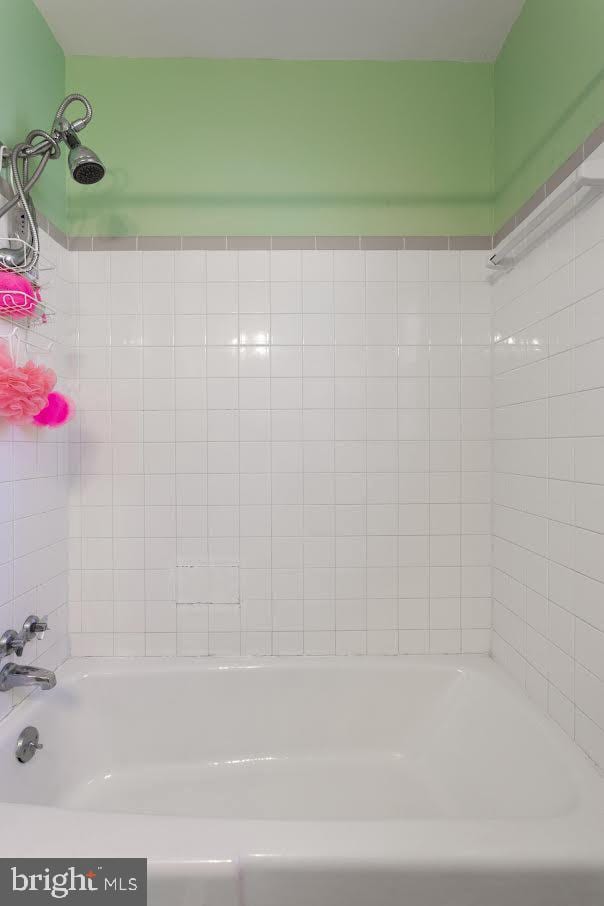 bathroom featuring bathtub / shower combination