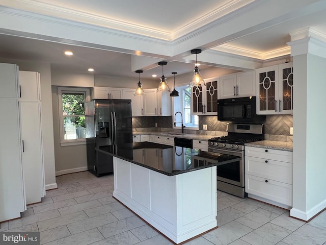 8107 Chester St, Takoma Park, MD 20912 - kitchen with black appliances, light marble finish floors, a sink, white cabinets, and crown molding