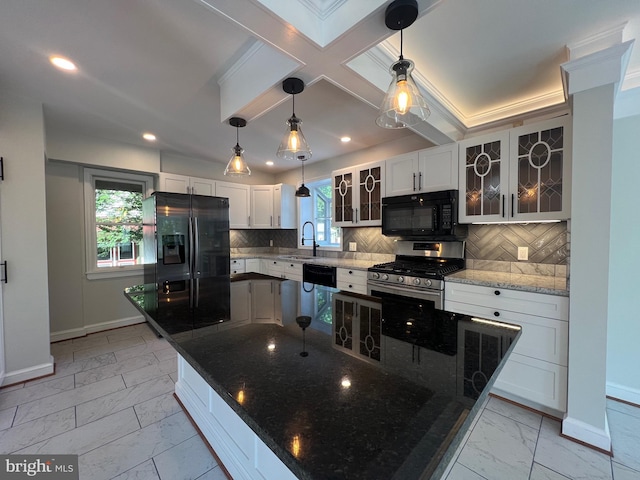 8107 Chester St, Takoma Park, MD 20912 - kitchen featuring black appliances, light marble finish flooring, baseboards, backsplash, and recessed lighting