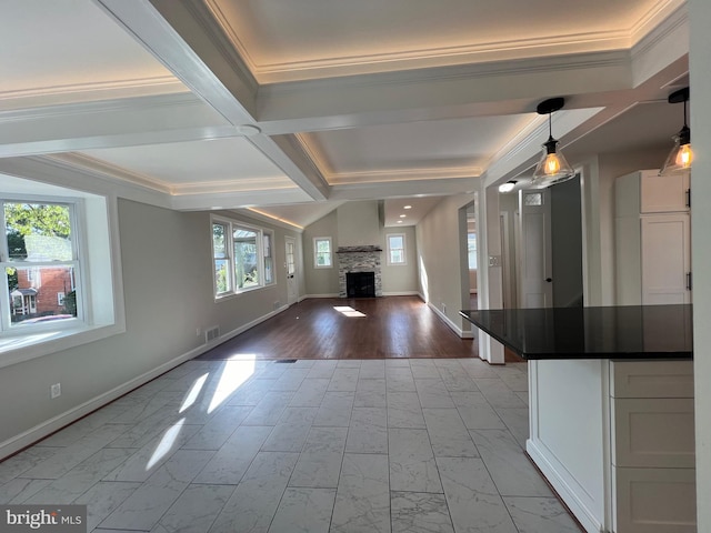 8107 Chester St, Takoma Park, MD 20912 - unfurnished living room featuring a fireplace, marble look tiles, crown molding, beamed ceiling, and baseboards