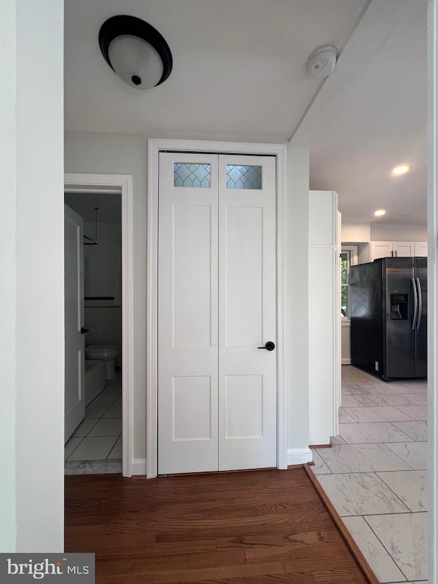 8107 Chester St, Takoma Park, MD 20912 - hallway featuring baseboards and light wood-type flooring