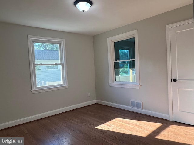 8107 Chester St, Takoma Park, MD 20912 - unfurnished room with dark wood-style flooring and baseboards