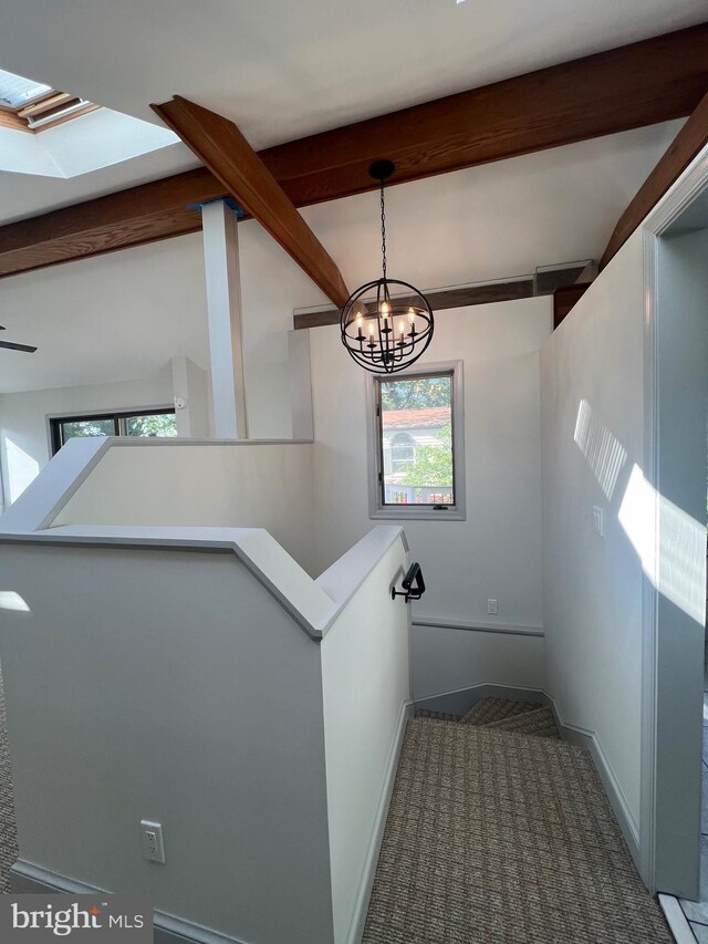 8107 Chester St, Takoma Park, MD 20912 - stairs featuring beamed ceiling, a chandelier, baseboards, and carpet