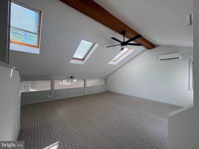 8107 Chester St, Takoma Park, MD 20912 - additional living space with a wall mounted air conditioner, carpet floors, a skylight, a ceiling fan, and baseboards