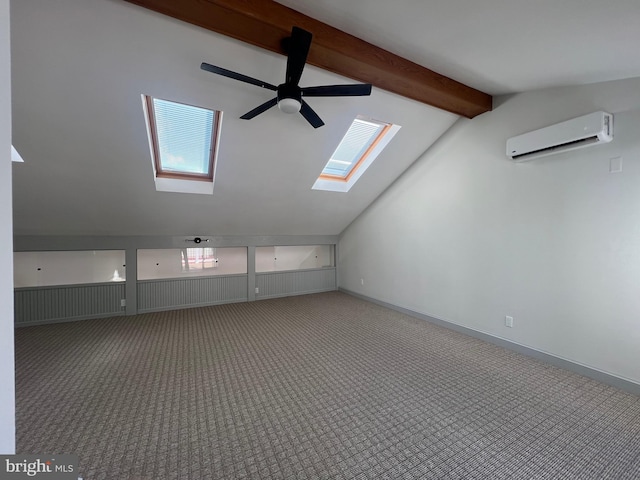 8107 Chester St, Takoma Park, MD 20912 - additional living space with a wall unit AC, a skylight, ceiling fan, and carpet
