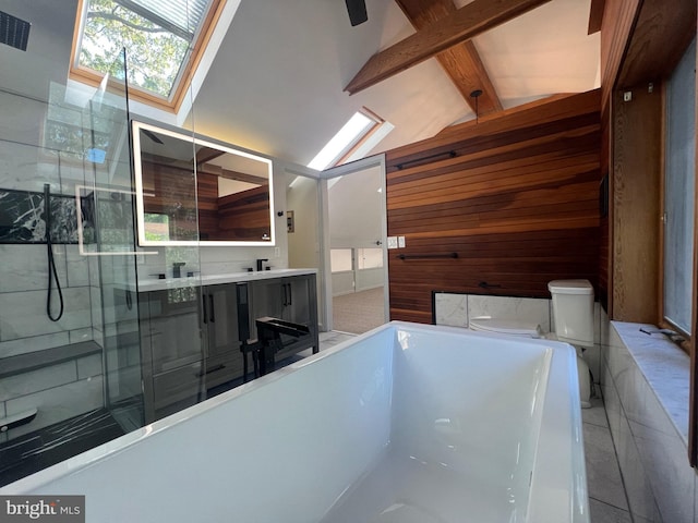 8107 Chester St, Takoma Park, MD 20912 - bathroom featuring a skylight, a freestanding tub, toilet, double vanity, and wooden walls