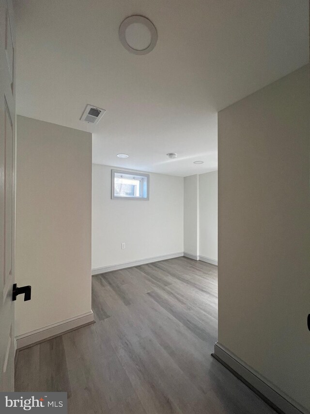 8107 Chester St, Takoma Park, MD 20912 - basement featuring wood finished floors and baseboards