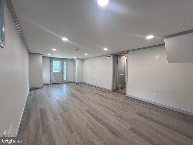 8107 Chester St, Takoma Park, MD 20912 - below grade area featuring recessed lighting, wood finished floors, baseboards, and crown molding