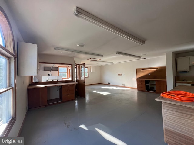 8107 Chester St, Takoma Park, MD 20912 - kitchen with open floor plan, finished concrete floors, and baseboards