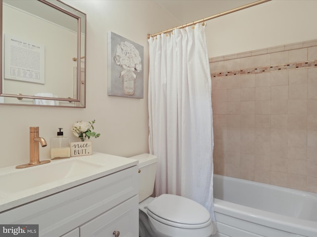 full bath featuring toilet, vanity, and shower / bath combo