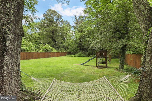 view of yard with a playground