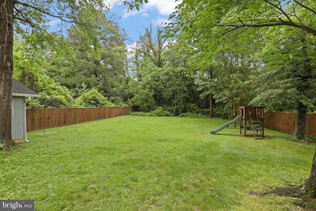 view of yard with a playground