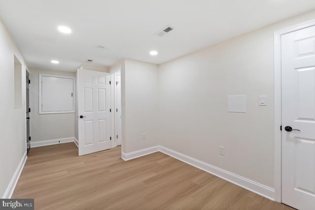 3505 Erdman Ave, Baltimore, MD 21213 - spare room with light wood finished floors, baseboards, and recessed lighting