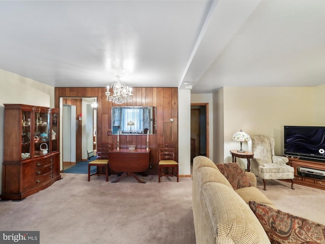 629 W Piedmont St, Keyser, WV 26726 - living area featuring carpet flooring, a chandelier, wooden walls, and a baseboard radiator