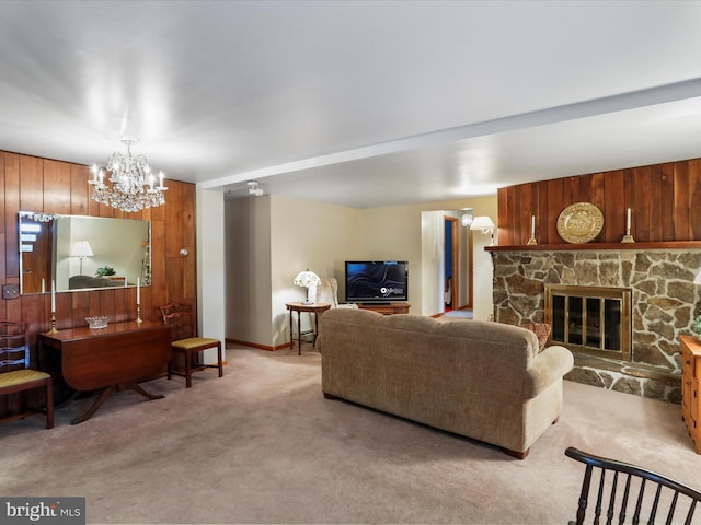 629 W Piedmont St, Keyser, WV 26726 - living area featuring carpet, a stone fireplace, and a chandelier