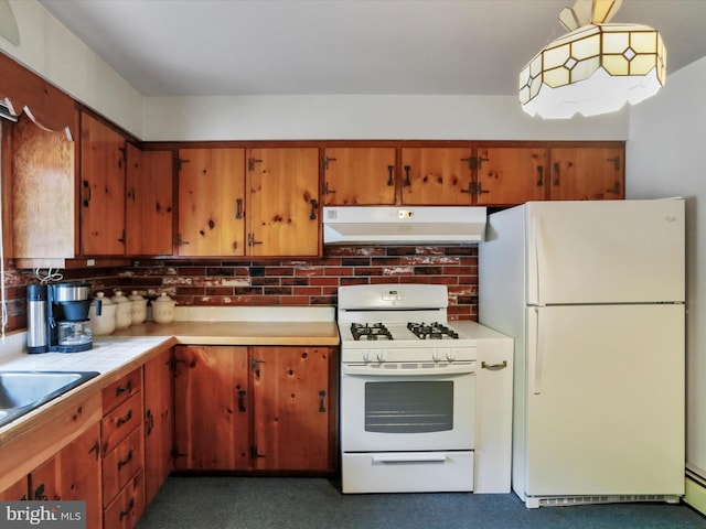 629 W Piedmont St, Keyser, WV 26726 - kitchen featuring white appliances, under cabinet range hood, tile countertops, tasteful backsplash, and brown cabinetry
