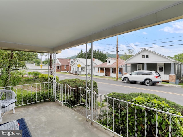 629 W Piedmont St, Keyser, WV 26726 - balcony featuring a porch and a residential view