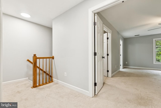 7702 Ousley Pl, Alexandria, VA 22315 - hallway with an upstairs landing and carpet