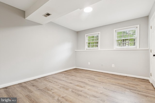 7702 Ousley Pl, Alexandria, VA 22315 - unfurnished room featuring wood finished floors and baseboards