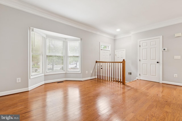 7702 Ousley Pl, Alexandria, VA 22315 - spare room with crown molding, light wood-type flooring, and recessed lighting