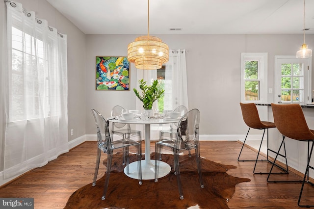 3902 Biddison Ln, Baltimore, MD 21206 - dining area featuring baseboards and wood finished floors