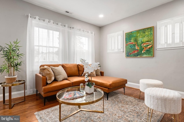 3902 Biddison Ln, Baltimore, MD 21206 - living room with baseboards, wood finished floors, and recessed lighting
