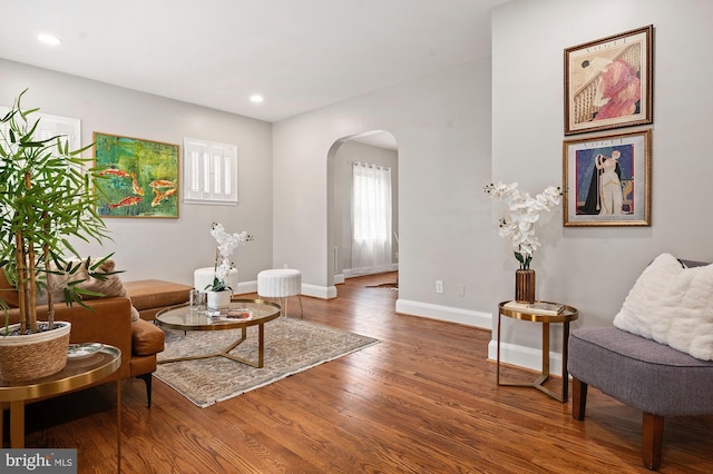 3902 Biddison Ln, Baltimore, MD 21206 - sitting room with arched walkways, wood finished floors, baseboards, and recessed lighting