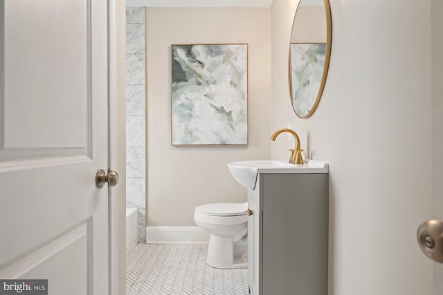 3902 Biddison Ln, Baltimore, MD 21206 - full bathroom with toilet, vanity, a tub, baseboards, and a shower