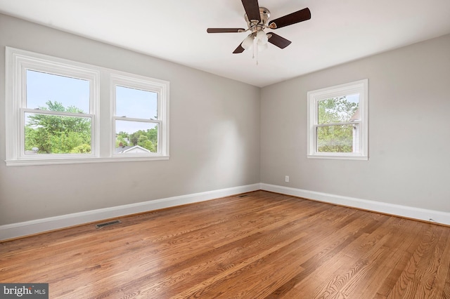 3902 Biddison Ln, Baltimore, MD 21206 - empty room featuring baseboards, light wood-style floors, and ceiling fan