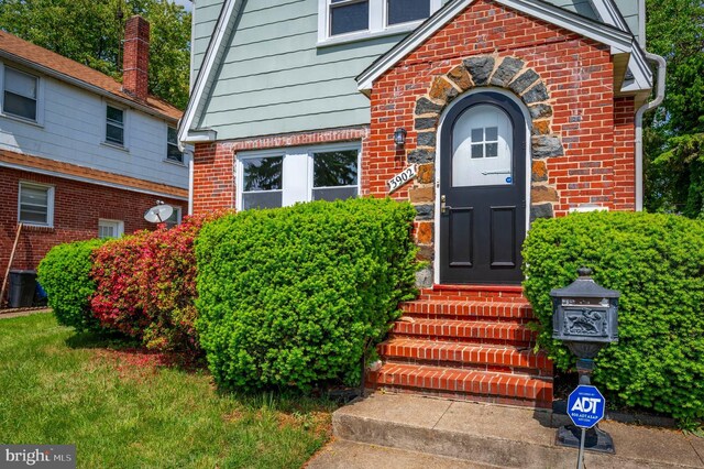 3902 Biddison Ln, Baltimore, MD 21206 - property entrance with brick siding