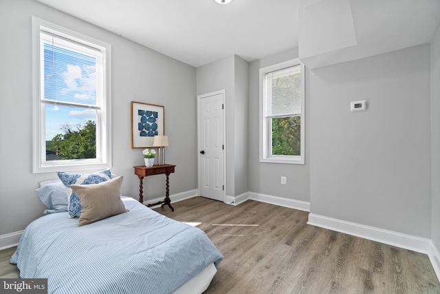 2704 Rueckert Ave, Baltimore, MD 21214 - bedroom featuring wood finished floors and baseboards