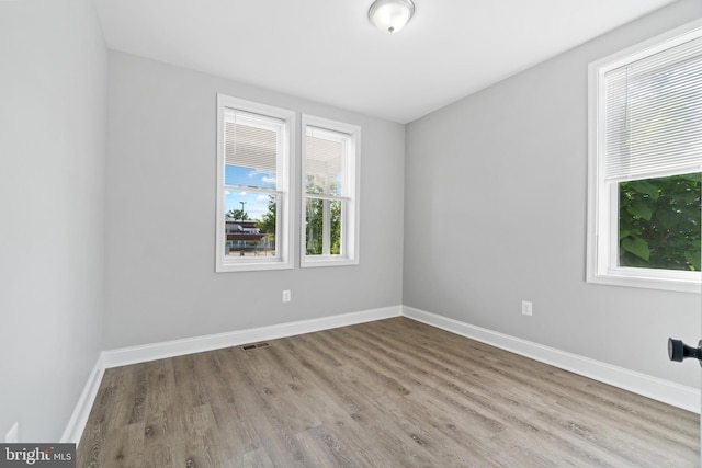 2704 Rueckert Ave, Baltimore, MD 21214 - empty room featuring wood finished floors and baseboards