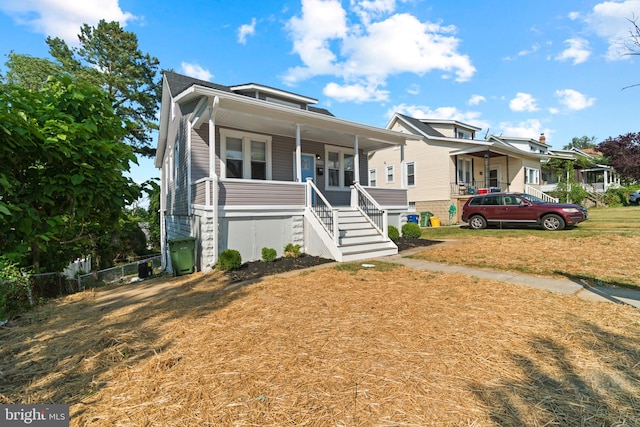 2704 Rueckert Ave, Baltimore, MD 21214 - view of front of house featuring a porch and stairs