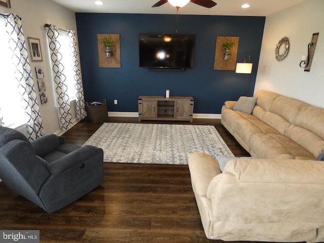 living room featuring a ceiling fan, recessed lighting, wood finished floors, and baseboards