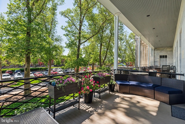 wooden deck with outdoor lounge area