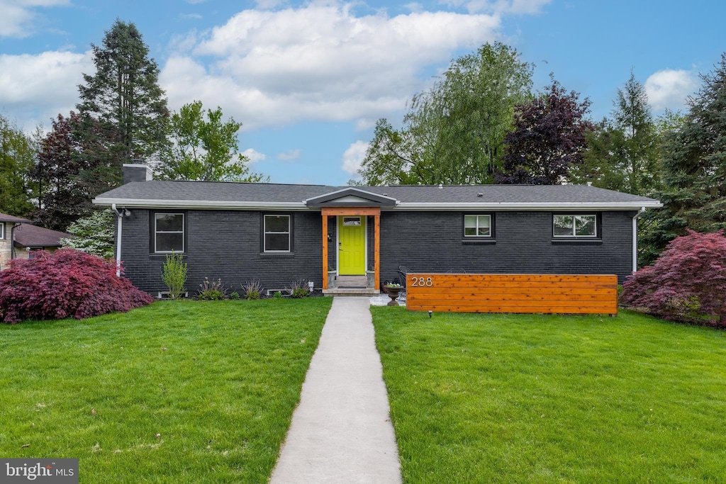 288 Nimitz Ave, State College, PA 16801 - view of front of property featuring a front yard, a chimney, and brick siding