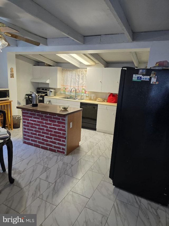 4527 Main St, Whitehall, PA 18052 - kitchen with black appliances, light marble finish floors, white cabinets, and beamed ceiling