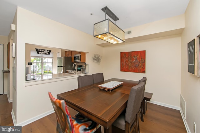 2706 Wimbledon Way, Blackwood, NJ 08012 - dining space featuring wood finished floors and baseboards