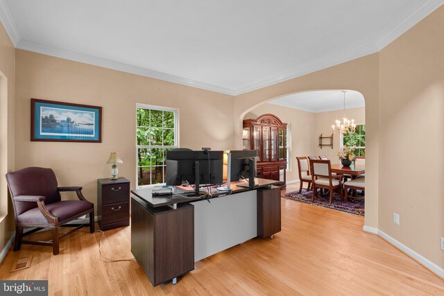 15066 Frederick Rd, Cooksville, MD 21723 - home office featuring arched walkways, light wood-style flooring, ornamental molding, baseboards, and a chandelier